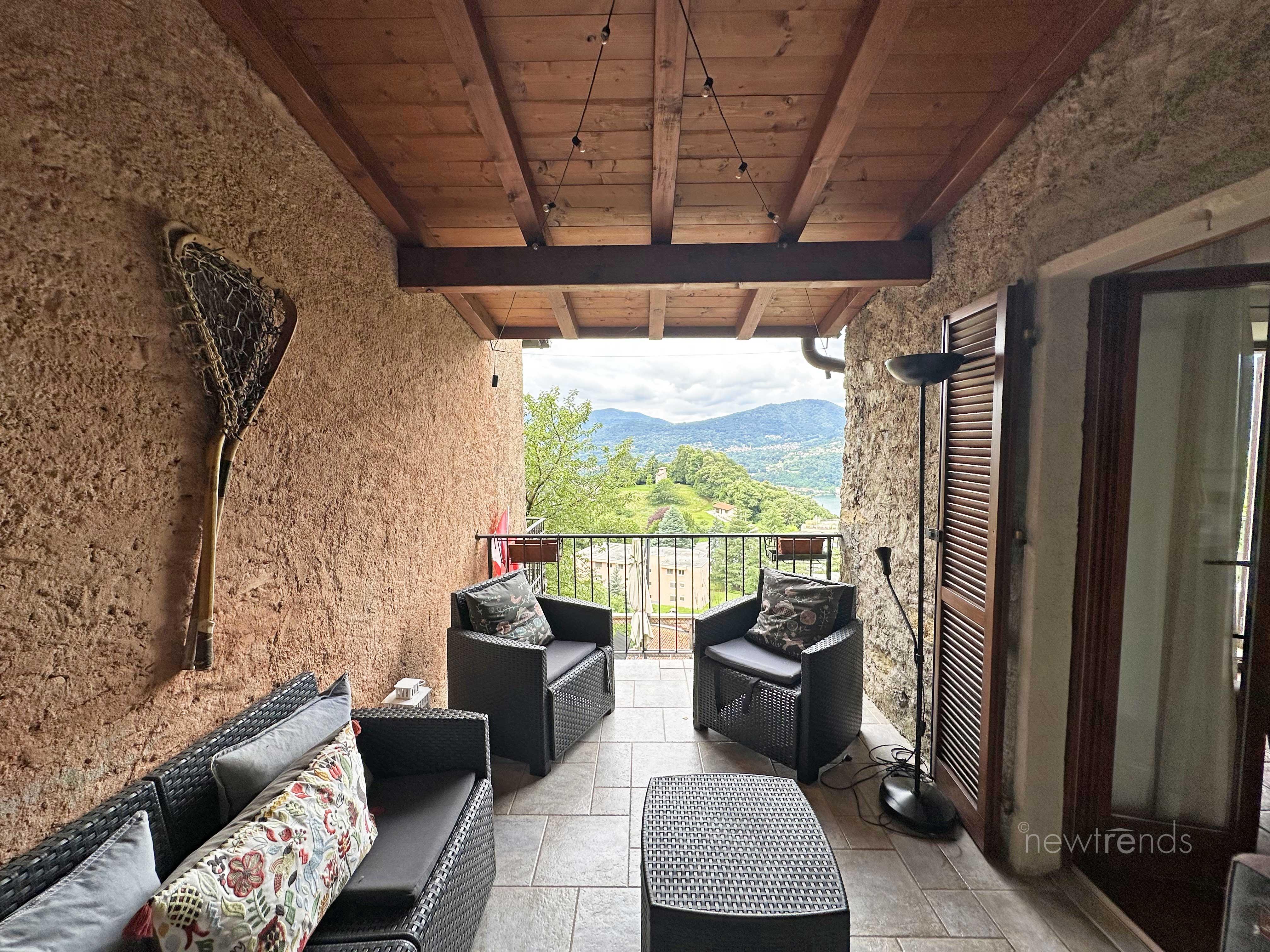 affittasi casa casa di nucleo con vista lago, loggiato e giardino a montagnola: foto loggiato